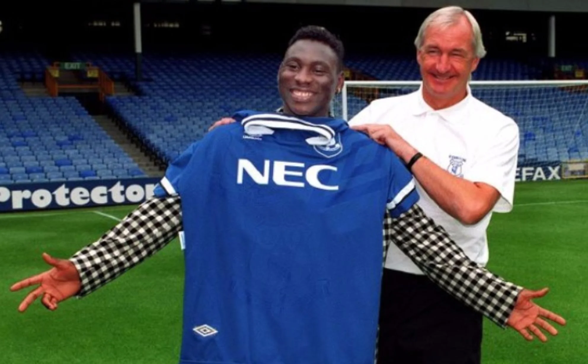 Daniel Amokachi with Mike Walker after signing for Everton in August 1994.
Fee paid £3million (to Club Brugge). Value now £65.9million.