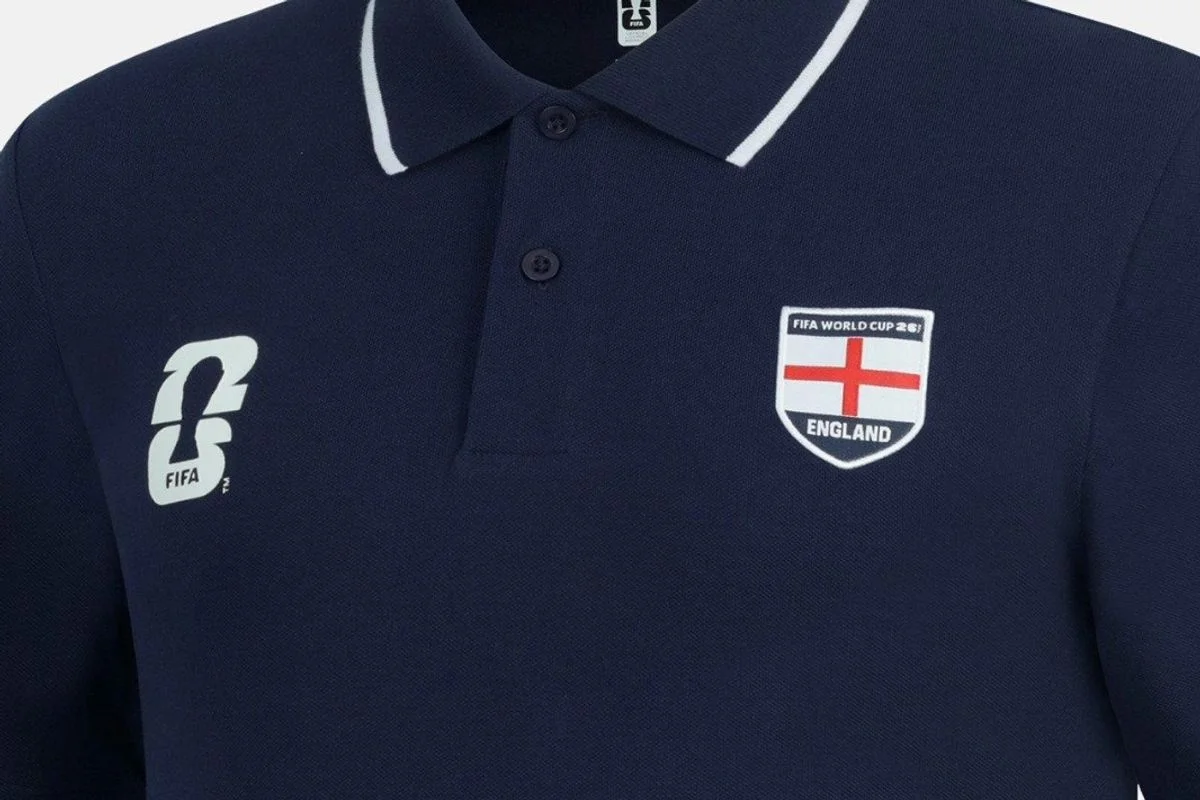 The official FIFA polo features England's crest and the World Cup 2026 logo